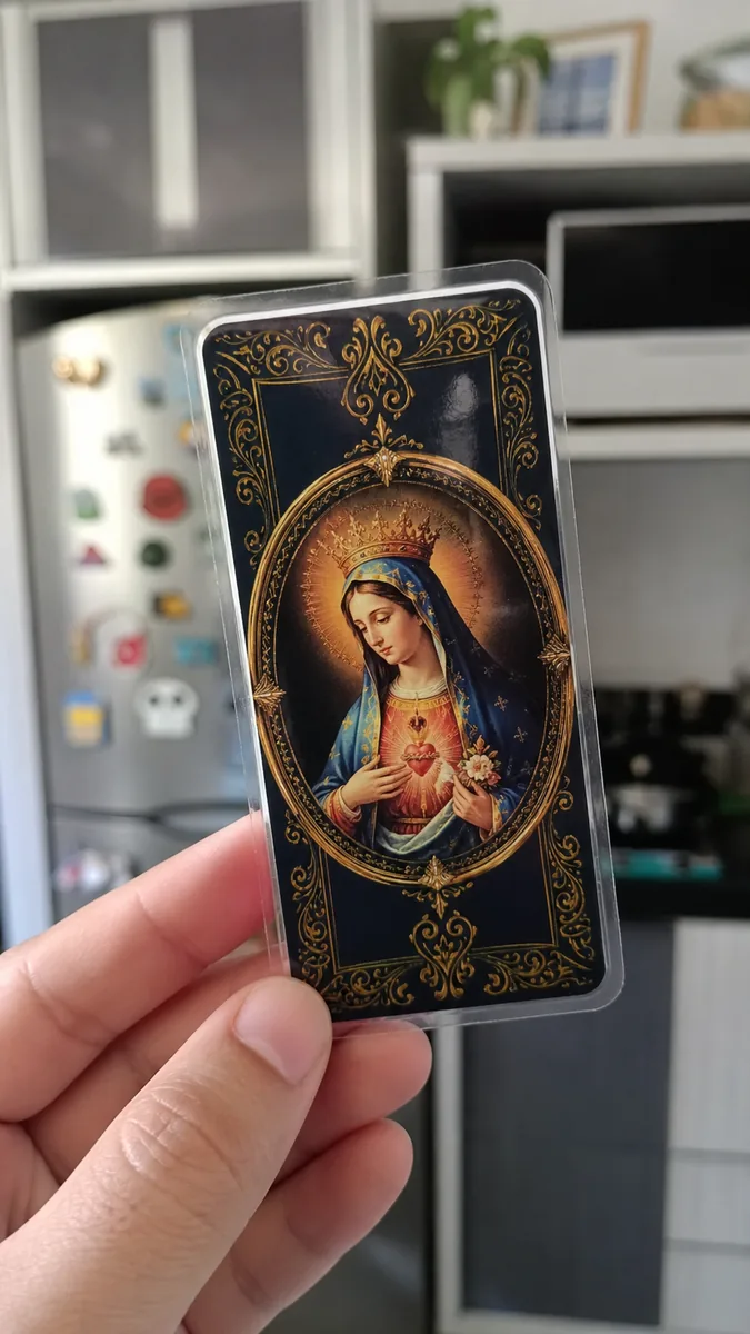 Foto enviada na conversa: marcadores católicos da Coleção Luz da Fé